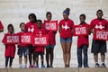 Children in red shirts for