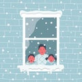 Children rejoice at the first snow. Little boy and girl are in the room is surprised, looking at the snow. Window on a snowy day Royalty Free Stock Photo