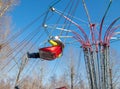 Children ride on the carousel in the park Royalty Free Stock Photo