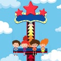 Children ride giant drop at theme park Royalty Free Stock Photo