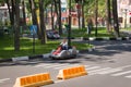 Children ride on the kart in the park