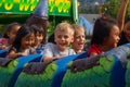 Children Ride Rollercoaster at Fair Royalty Free Stock Photo
