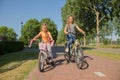 Children ride their bicycles on the bike path Royalty Free Stock Photo