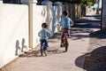 Children riding bicycles in Glenelg