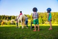 Children riding horse