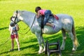 Children riding horse
