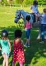 Children riding horse