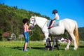 Children riding horse