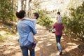 Children Riding On Parent`s Shoulders On Countryside Walk Royalty Free Stock Photo