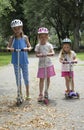 Children riding scooters USA