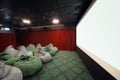 Children room with soft green seats in cinema