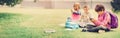 Children with rucksacks standing in the park near school Royalty Free Stock Photo