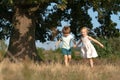 Children run on field. Children farmer concept. Happy children farmers working with spud on spring field. Happy children Royalty Free Stock Photo