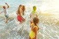 Children run to swim in the sea. Royalty Free Stock Photo