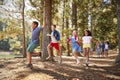 Children Running Ahead Of Parents On Family Hiking Adventure Royalty Free Stock Photo