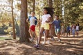 Children Running Ahead Of Parents On Family Hiking Adventure Royalty Free Stock Photo