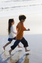 Children Running on Beach Royalty Free Stock Photo