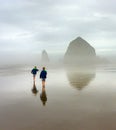 Children Running on Foggy Beach