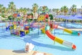 Children`s aqua park zone with sliders and pool Royalty Free Stock Photo