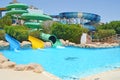 Children`s aqua park zone with sliders and pool Royalty Free Stock Photo