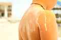 Children`s back with sunscreen Royalty Free Stock Photo