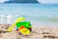 Children`s beach toys - buckets, spade, machine, car and shovel on sand on a sunny day. Royalty Free Stock Photo