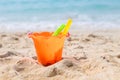 Children`s beach toys - buckets, spade and shovel on sand on a sunny day.