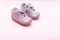 Children`s boots for girls pink color on a pink background