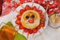 Children's breakfast pancakes smiling face of the Royalty Free Stock Photo