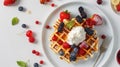 children's breakfast with a top-down capturing a plate adorned with one waffle, assorted fruits, berries, and