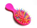 Children`s bright pink hair brush Royalty Free Stock Photo