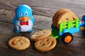 Childrens butter cookies and vehicle toy Royalty Free Stock Photo