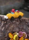 Children`s car made from dry corn cob. family creativity with children from natural materials