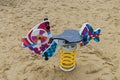 Children`s carousel on the playground in the yard in the form of a fish Royalty Free Stock Photo