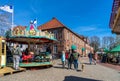 Children`s carousel in the port of Hooksiel, Germany