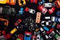 Children`s cars toys for developing baby games on a black background Royalty Free Stock Photo