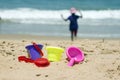 Children's colorful sandy toys on beautiful a beach. India Goa