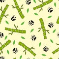 Children`s colorful seamless pattern. vector with cartoon bamboo, leaves, animal tracks on a light neutral background. hand drawin