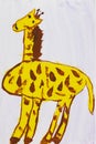 Big yellow giraffe. Real drawing of a small child. Gouache drawing.