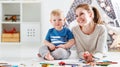 Children creativity. mother and baby son drawing together Royalty Free Stock Photo