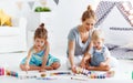 Children`s creativity. mother and children draw paints in play Royalty Free Stock Photo