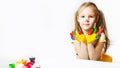 children\'s creativity.Portrait Cute caucasian preschool little girl with face and hands painted at home Royalty Free Stock Photo