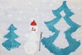 Serious snowman and two Christmas trees. Real drawing of a small child. Gouache drawing.