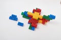 Figures from a colored cubes designer on a white background Royalty Free Stock Photo