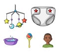 Children`s diapers, a toy over the crib, a rattle, a children`s bath. Baby born set collection icons in cartoon style Royalty Free Stock Photo