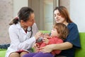 Children's doctor examining 2 years child