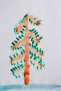 Children`s drawing of alone Christmas tree standing in snow