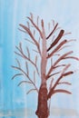 Children`s drawing with brown tree on blueish background. Childish drawing