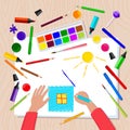 Children`s drawing with colored pencils on white paper Royalty Free Stock Photo