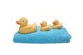 Children's duck with ducklings on towel isolated on white Royalty Free Stock Photo